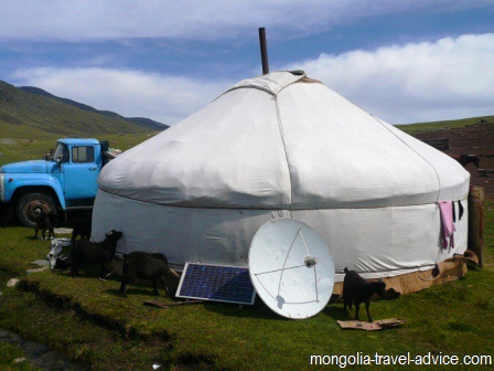 mongolia images: ger yurt with solar panel and satellite dish